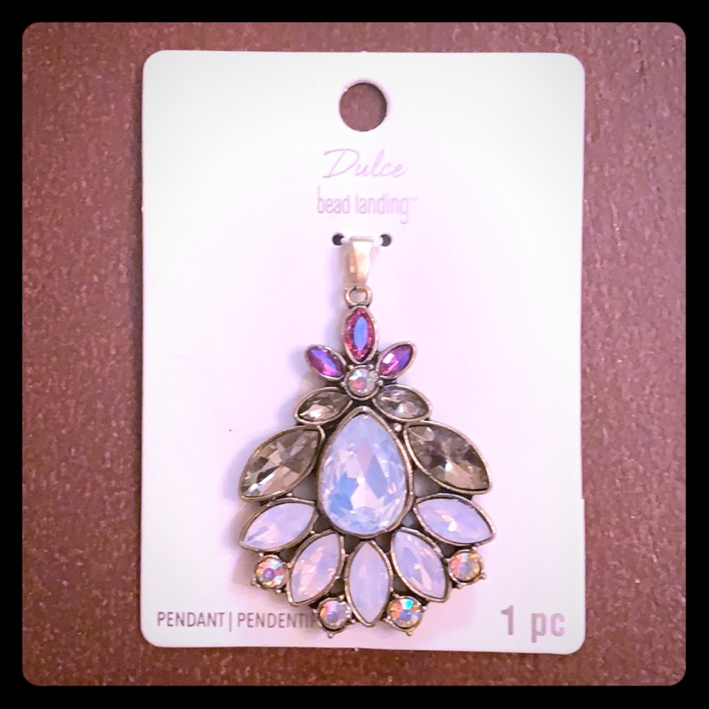 NWT pendant by bead landing